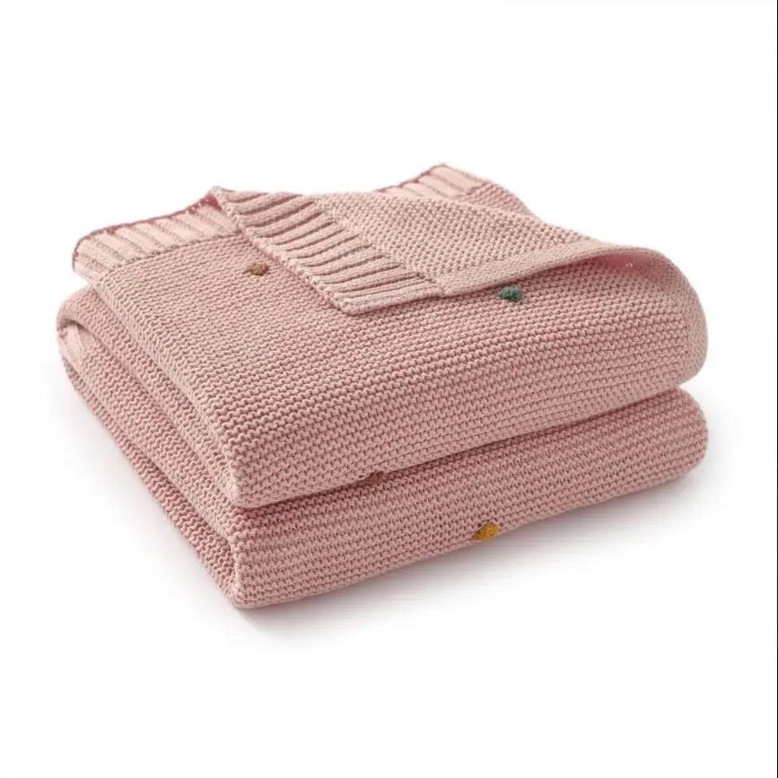 COBIJA TEJIDA ROSA CON PUNTOS