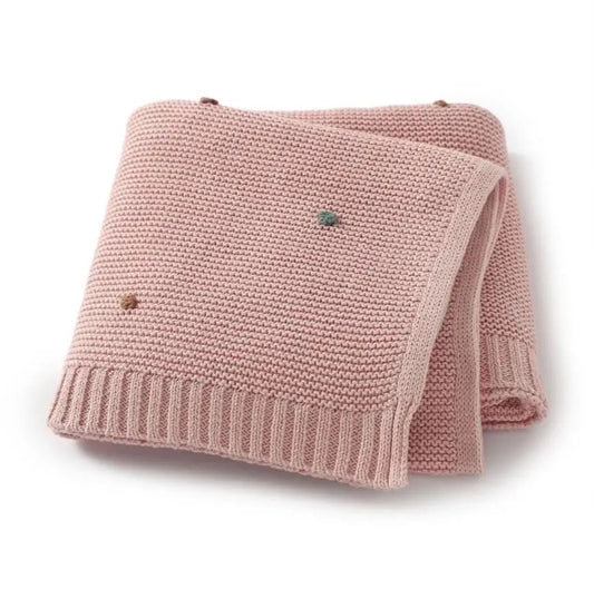 COBIJA TEJIDA ROSA CON PUNTOS