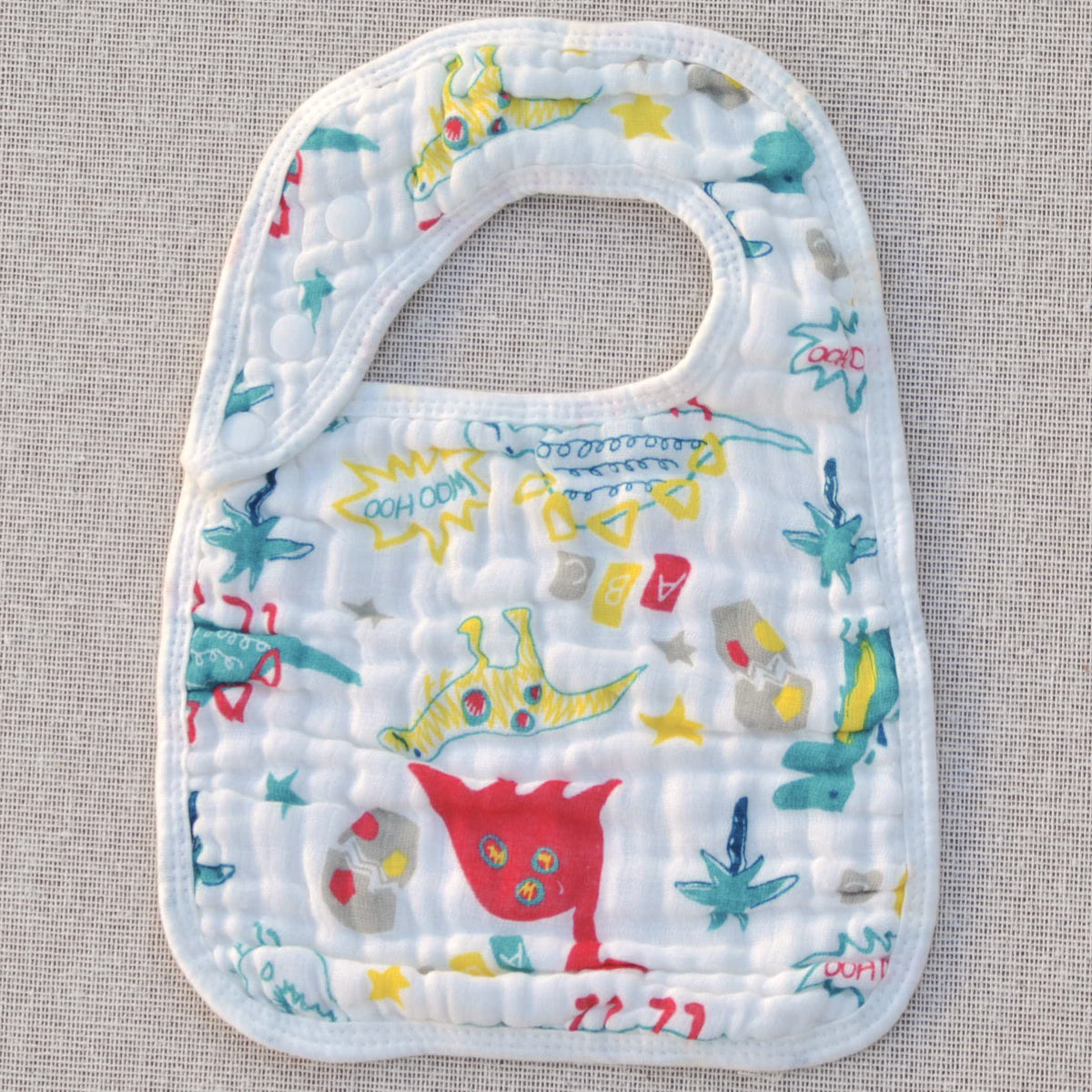 BABERO DINOSAURIOS COLORES - Tily Babyshop